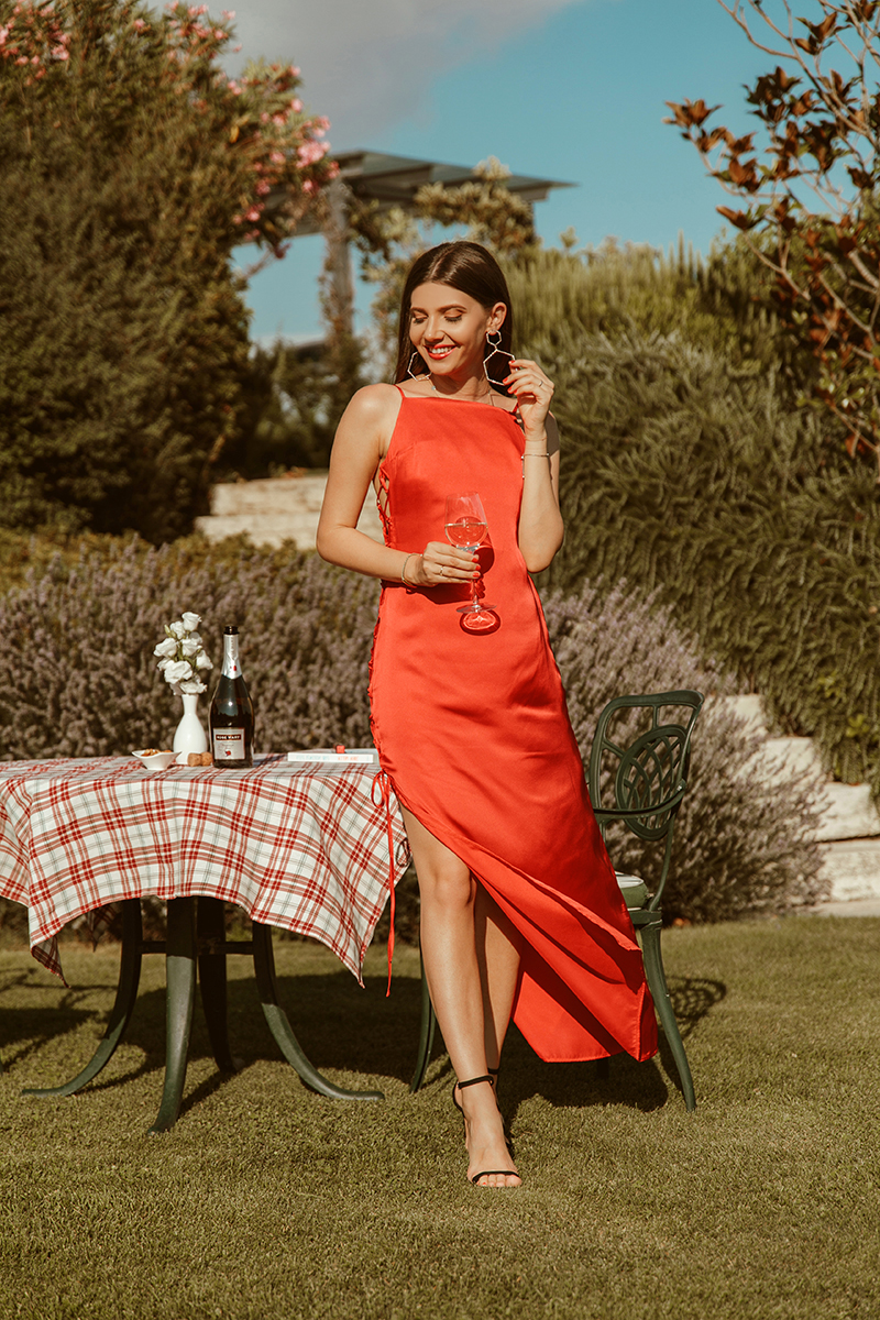 laisa costea, larisa style, larisa in italy, tuscany, toscana, bella italia, montepulciano, adler therme, montalcin, vinery, vineyard, wine, rose, champagne, prosecco, summer drink, rose mary, vin spumant, sampanie, picnic, brunch, fruits, picnic basket, nakd, dress, floral print dress, picnic dress, wide brim hat, asos hat, straw hat, vintage camera, cult gaia bag, soludos slippers, shopbop, nakd discount code, red dress, red satin dress, white wine, rose wine, wine, fancy crystal glass, wine glass, flowers, red satin, silk dress, sexy red dress, asos earrings, sleek hair, hair jewelry, leaf hair clips, gold earrings, gold hair clip, romantic dinner, cypresses, tuscany view, picnic blanket, travel, travel blogger, book, sub aceeasi stea, estee lauder lipstick, fashion blogger, fashion style, outfit inspiration, ootd, the fault in our stars
