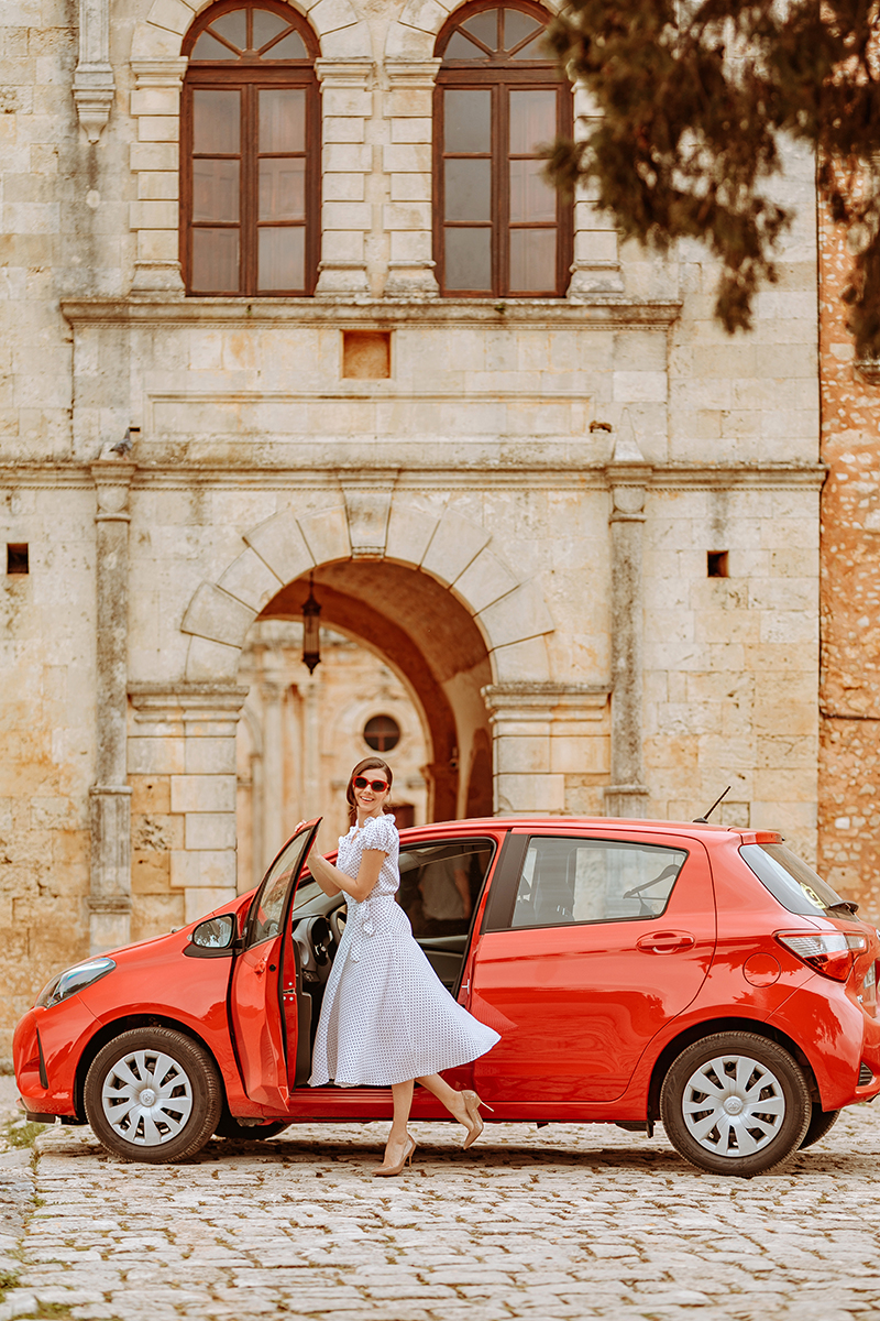 larisa costea, larisa costea blog,larisa style, larisa in greece, greece, crete, creta, arkadi,monastery, goldcar, car rental, inchirieri masini, bestcardeals, rentals,road trip, roadtrip, toyota yaris, red car, trip, travel, travelblog, fashion blog,lifestyle, polka dots,dress, polkadot dress, la maison de confiance, rochie cu buline, rochie de zi, rochie retro, retro sunnies, epica, tezyo, kurt geiger stilettos, beige heels, old church,chania airport, chania rental cars 