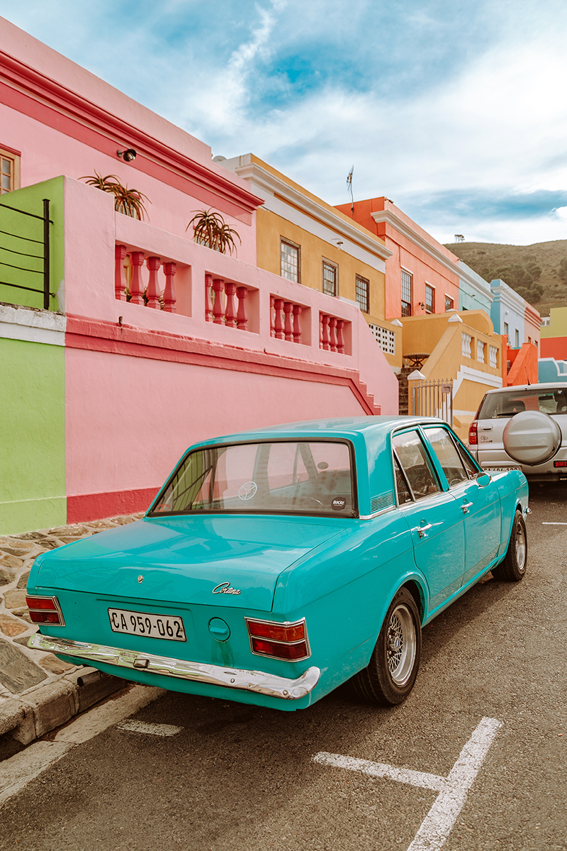 larisa costea,larisa costea blog, fashion blog, travel blog, traveler, cape town, bo-kaap, neighbourhood, colourful buildings, rainbow buildings, vintage car, chicwish floral top,floralprint, chic top, vintage jeans, chic look,outfit, cult gaia, bamboo bag, white sandals, sam edelman, best vacation, best destination, south africa 