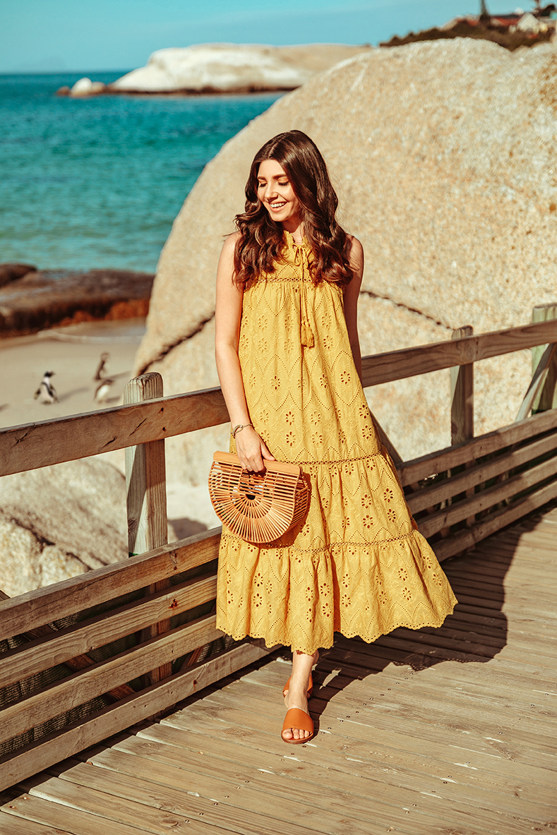 larisa costea,larisa style, larisa in south africa, larisa costea blog,south africa, cape town, simons town,boulders beach,penguin,penguins, beach, africa, best vacation, best destination, travel,traveler, eyelet dress, lace dress, embroidery dress,mustartd yellow dress, chicwish, summer outfit, summer dress, ootd, holiday style, outfit inspiration,madewell slides,shopbop, leather slippers brown slippers,cult gaia bamboo bag, soft curls, ray ban sunglasses, south african penguin