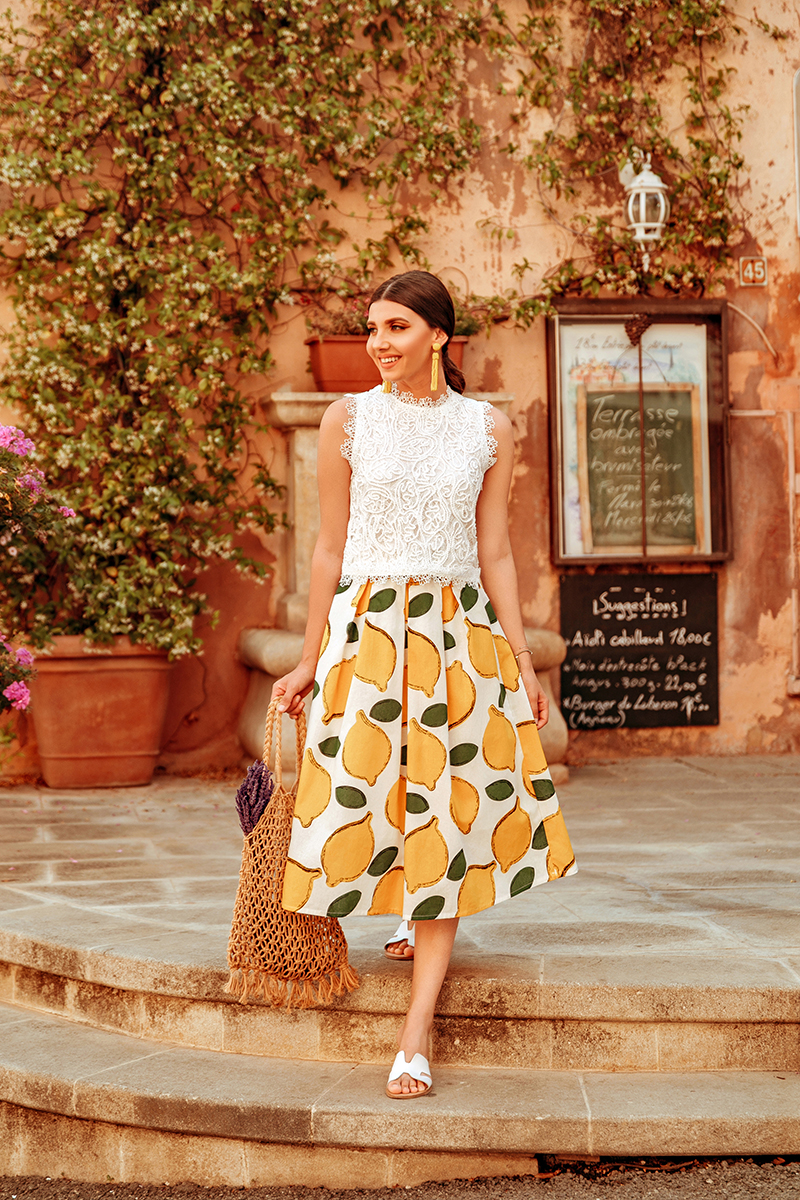 larisa costea, larisa costea blog, larisain provence,larisa style, fashion blog,travel blog, traveler, best destination, best vacation,summer 2019, rousillon,provemce, colorado provencal, canyons, red buildings,pink buildings, salmon buildings, chicwish ootd,chicwish full outfit, chicwish lace top,white lace top, a line skirt, chicwish skirt,lemon print skirt, white skirt, fruit print, lavender bouquest, straw bag, madewell, shopbop, white slides, perfect summer slides, ootd, outfit inspiration,primark earrings,yelloe earrings, bead earrings